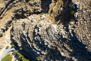 Aerial view of Jacobs Canyon. Brown massive stones and rocks in mountain canyon. Located between Siana and Embona. Rhodes, Greece.