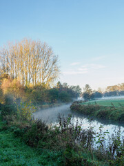 Naklejka na ściany i meble Herbstmorgen an einem Fluß im Münsterland
