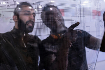 Designers looking at transparent grid