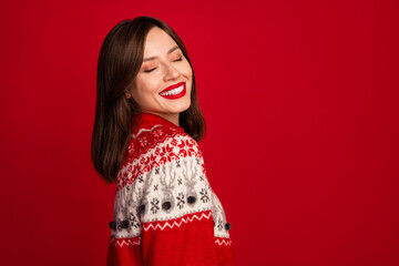 Portrait of nice cute positive satisfied woman with bob hairdo dressed red sweater smiling eyes closed isolated on red color background