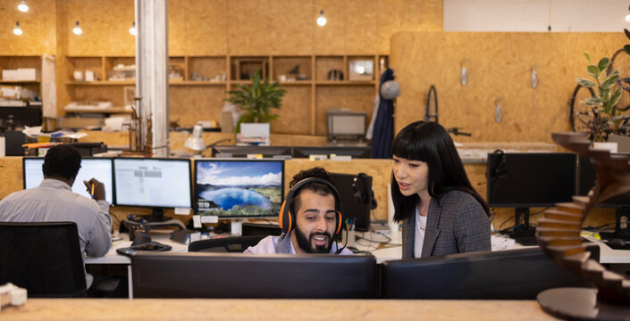 Business People Talking, Working At Computer In Office