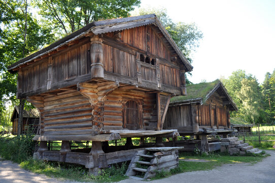 Oslo, Norway - Old wooden houses with grass on the roof at the Norwegian Folk Museum in the city center..