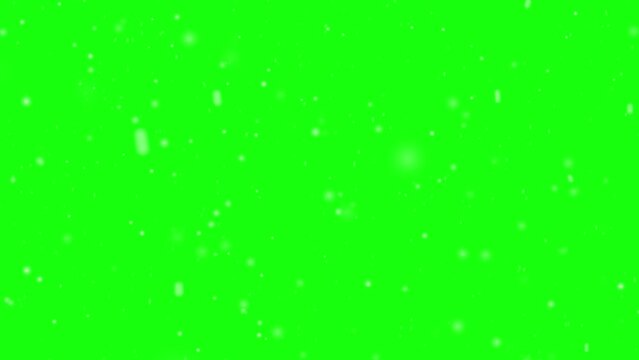 Simple falling snow animation on green screen chroma key background. 4K Motion graphic video animation. Winter Christmas holiday background concept