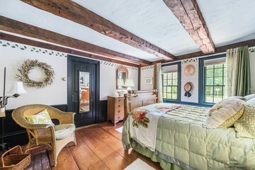Bedroom with antique and modern interior mixture