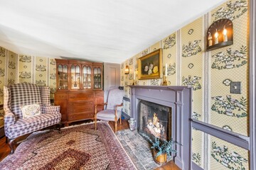 Living room with antique and modern interior mixture