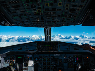 cockpit of plane looking at the Himalaya
