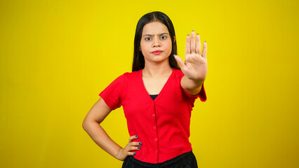 Portrait of a Asian beautiful young woman unhappy or confident standing say no, studio shot...