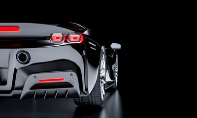 carbon fiber sports car, rear view on a dark background.