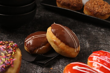 Delicious donut on a consistent ground and a distinctive product