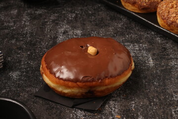 Delicious donut on a consistent ground and a distinctive product