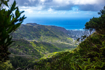Fototapeta na wymiar panorama of the hawaiian island of oahu and honolulu as seen from the top of the wiliwilinui ridge trail, hiking in the hawaiian mountains, the amazing landscape of oahu