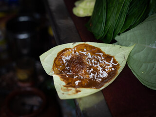 Banarasi paan, betel nut garnished with all indian banarasi ingredients on paan ready to sale.