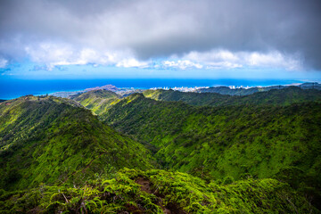 panorama of the hawaiian island of oahu and honolulu as seen from the top of the wiliwilinui ridge trail, hiking in the hawaiian mountains, the amazing landscape of oahu