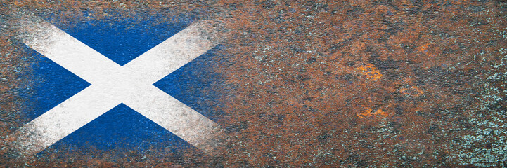 Fototapeta na wymiar Flag of Scotland. Flag painted on rusty surface. Rusty background. Copy space. Textured creative background