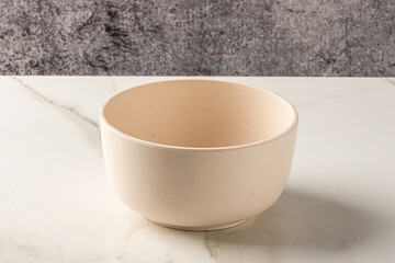 Pot on white marbled background. Isolated