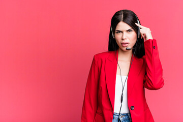 feeling confused and puzzled, showing you are insane. telemarketer with a headset concept
