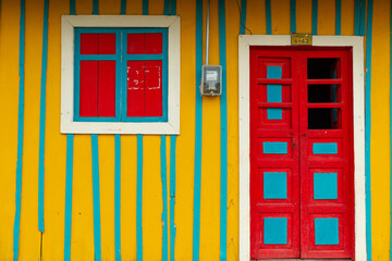 Obraz premium dors and windos decorete the wooden walls of a characteristic little town in Colombia. Named Murillo, this spectacular quite place is a settlement over three thousand meters above sea level.