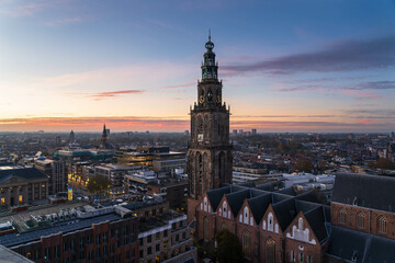 Fototapeta na wymiar Dusk over the historical city centre of Groningen on a beautiful day.