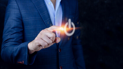 Businessman pushing visual touch screen power button with his finger,network structure,Hand pressing power button