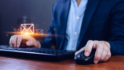 Businessman touching checking email online with virtual interface technology.Direct marketing, online message, E-mail, electronic mail,communication concept.
