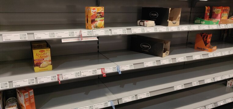 Closeup of Empty shelves in supermarkets during a shortage peri