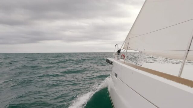 Yacht sailing in super slow motion with text space