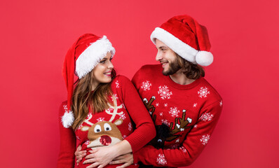 happy new year couple in love wear sweater and santa claus hat, christmas