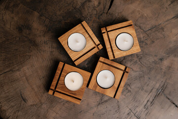 A set of handmade square wooden candlesticks