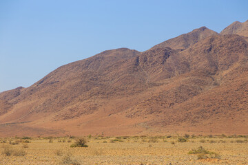 Namibian landscape along the gravel road. Sossusvlei, Namibia.