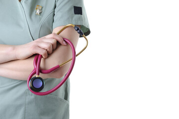 Close-up of a beautiful female physician in medical uniform holding a stethoscope isolated on a white - 546998093