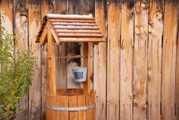 Wooden Well with Snow