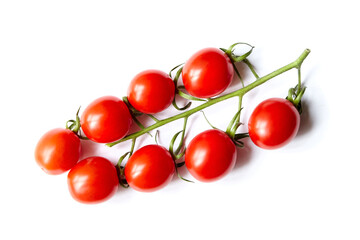 Cherry tomatoes cluster isolated on white. Fresh vegetable. Red cherry tomatoes on stem, top view