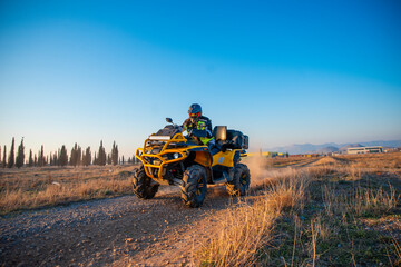 Girl riding a quad bike