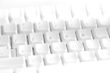 White keyboard with the letters rearrange to spell the word 