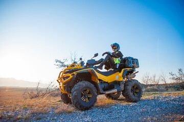 Fototapeta premium Girl riding a quad bike