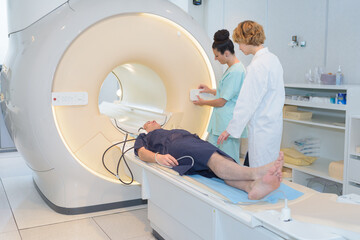 patient undergoing mri scan at hospital