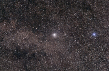 Obraz na płótnie Canvas The stars Alpha and Beta Centauri, with Alpha at center