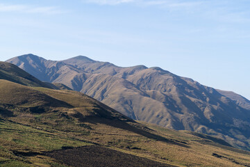 Fototapeta premium Wonderful spring landscape with sky, mountains and hills