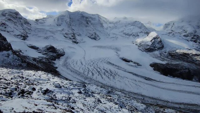Majestic view of Morteratsch Glacier in Switzerland from Refuge Diavolezza at an altitude of 2972 meters.