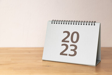 2023 paper calendar on the wooden table
