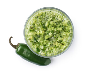 Bowl of tasty green salsa sauce on white background