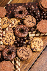Dark and milk chocolate products and biscuits