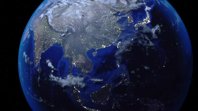 Zoom out of China through clouds to see the Earth from space.