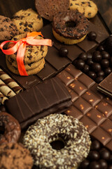 Chocolates and biscuits assortment background