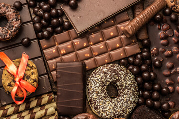Chocolates and biscuits assortment background