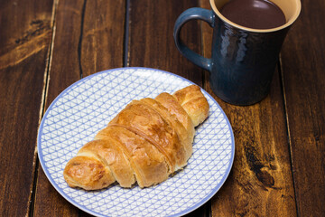 Yummy freshly croissant with chocolate