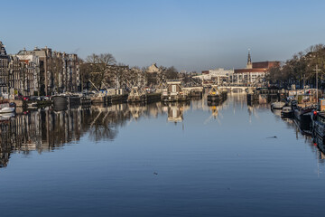 Obraz premium Amstel locks originally built in 1673, after canal belt had its fourth expansion. Amstel locks renovated in 19th century. Amsterdam, the Netherlands.