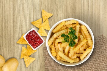 Tasty fast food fry potato with sause