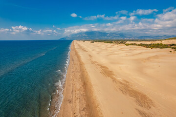 Aerial top view Patara sandy beach with blue sea Kalkan, Antalya Turkey