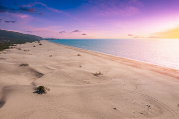 Beautiful sunset Patara sandy beach with blue sea Kalkan, Antalya Turkey, aerial top view